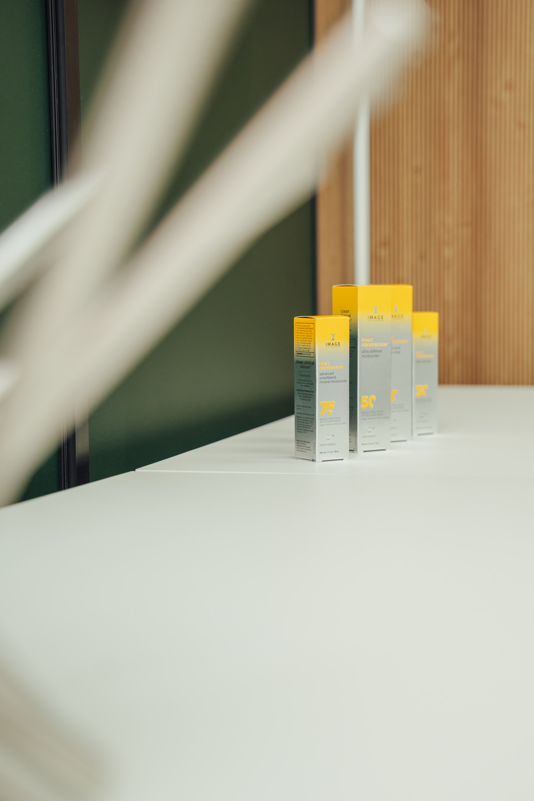 IMAGE Skincare Daily Prevention products on a white counter at Glow Lab